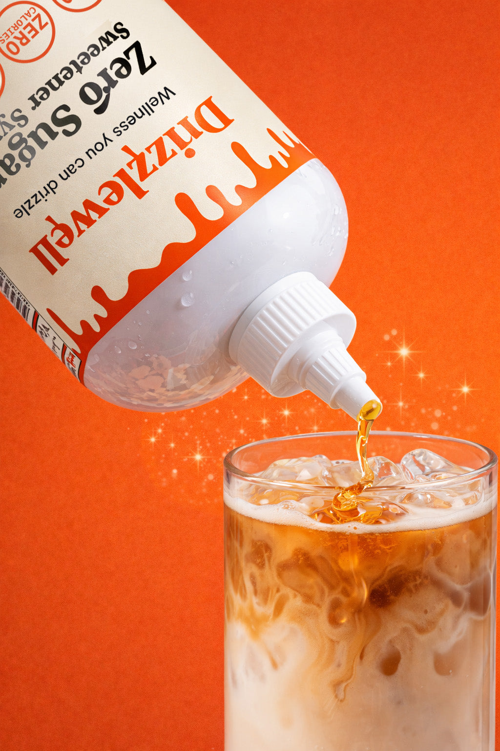 Drizzlewell zero sugar sweetener syrup poured into iced coffee, zero calorie and zero net carb syrup made with allulose and monk fruit, keto friendly and diabetic friendly, perfect for coffee, baking, cooking, cocktails and more